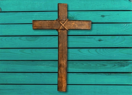 Holy wooden cross isolated on white backgroundの写真素材