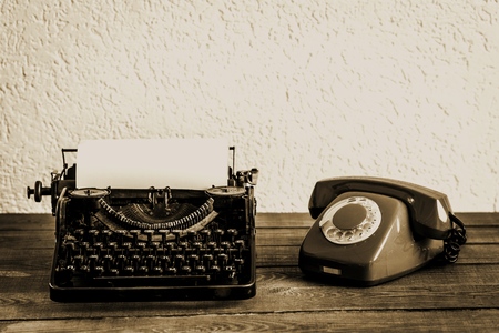 Old typewriter with books  on backgroundの写真素材