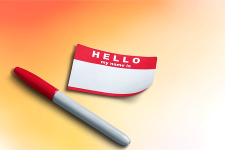 Red Hello My Name Is Tag and penの写真素材