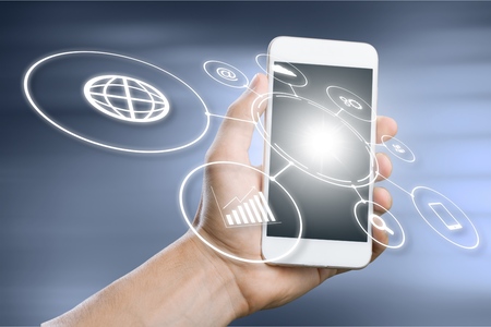 Industry 4.0 concept, intelligent factory with control over the Internet. Use smartphone to check...