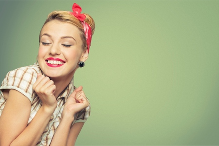 Young happy woman in pin up styleの写真素材