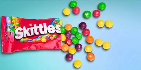 KHERSON, UKRAINE - NOVEMBER 05, 2014:  Closeup of Skittles candies made by Wm. Wrigley Jr. Company isolated on white backgroundのeditorial素材