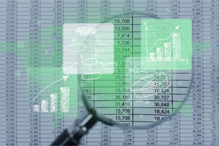 Spreadsheet bank accounts accounting with calculator and magnifying glass. Concept for financial...