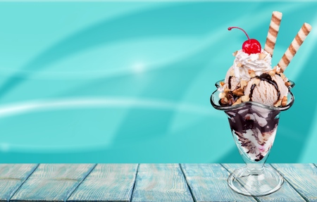 Tasty ,sweet Ice Cream  in cup on backgroundの写真素材