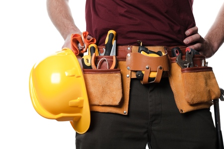 Construction equipments on the waist of a worker