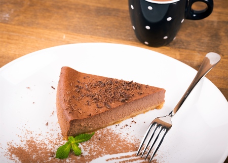 Close up of a piece of cake with a forkの写真素材