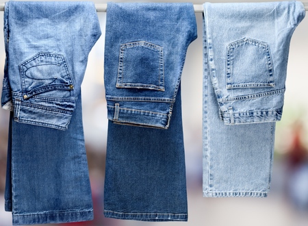 Blue denim jeans on blurred backgroundの写真素材