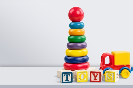 Colorful cubes and toys on blurred backgroundの写真素材
