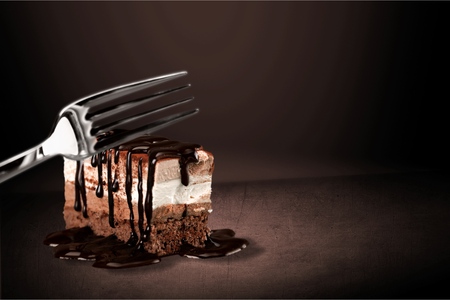 Tasty tiramisu cake on dark backgroundの写真素材