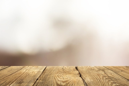 Wooden pier with blurred sea background