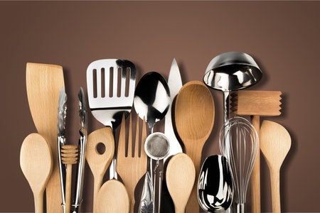 Kitchen metal and wooden utensil on  backgroundの写真素材