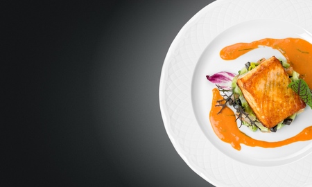 Steamed cod fish filet and sauceの写真素材