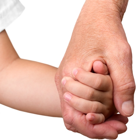 Elderly and Child Hands Holding Togetherの写真素材