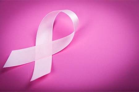 Pink Ribbon on Pink Backgroundの写真素材