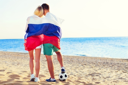 Beach couple walking on romantic travel honeymoonの写真素材