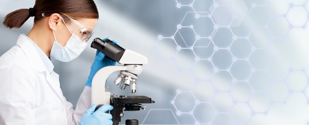 Scientist researcher using microscope in laboratory. Medical healthcare technology and...