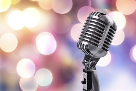 Close up of microphone setting on stand with colorful light bokeh background in conference hall .
Microphone on stage .の写真素材