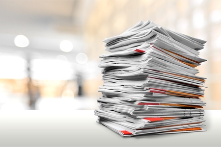 File folders with documents on white tableの写真素材