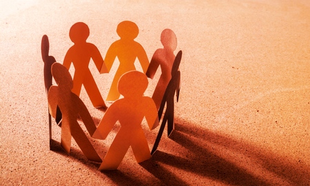 Paper People in a Circle Holding Handsの写真素材