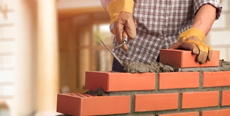 Masonry build bricklayer construction handyman layer trowelの写真素材