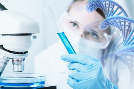 Young Female Scientist Working with Microscope
