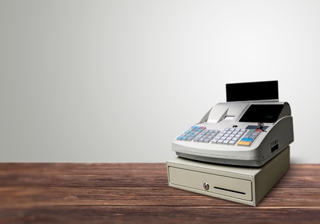 Cash register with LCD display on backgroundの写真素材