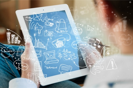 Businessman working with tablet and social media with modern sketch symbolの写真素材