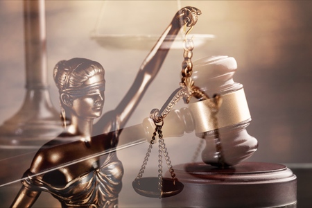 Wooden judge gavel on blurred background close-up viewの写真素材