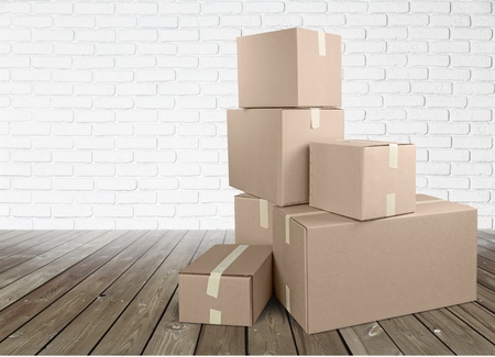Different cardboard boxes in roomの写真素材