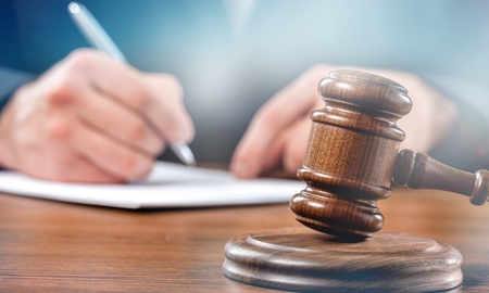 Close up gavel judge with lawyer working at courtroom.の写真素材