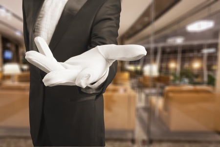 Elegant human hand in white gloveの写真素材
