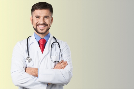Handsome doctor portrait  on backgroundの写真素材