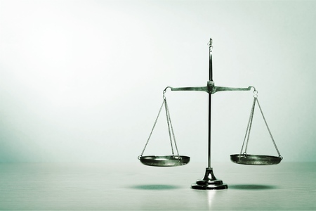 Law scales on table backgroundの写真素材