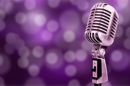 Retro style microphone on  backgroundの写真素材