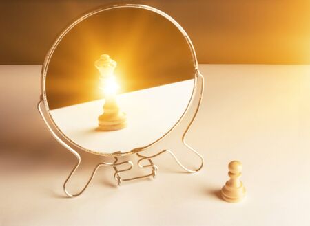 Chess Pawn Looking in the Mirror and Seeing a Queenの写真素材