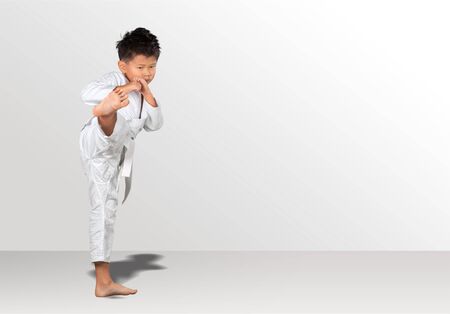 Taekwondo kids in white ammunitionの写真素材