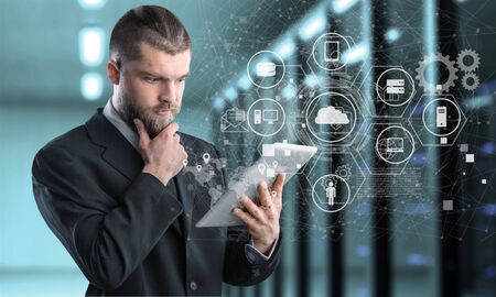 business person holding futuristic tablet PC