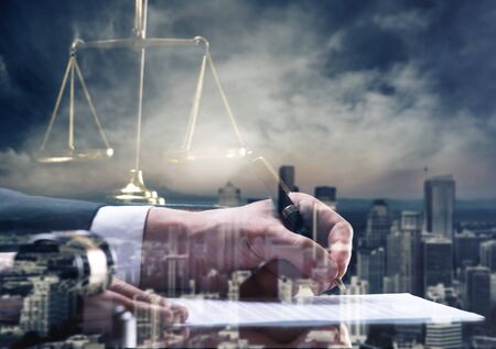 Wooden gavel on table. Attorney working in courtroom. law attorney court judge justice gavel legal legislation conceptの写真素材