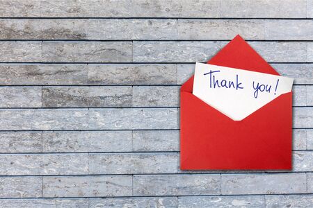 Blank card and envelope with thank you on backgroundの写真素材