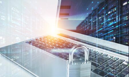 Laptop with padlock and server farm, data security concept