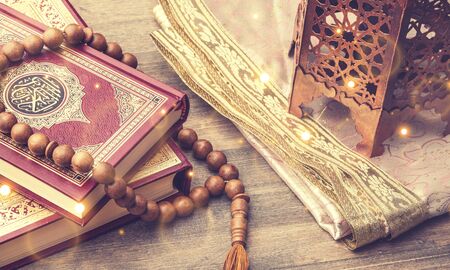 Ramadhan objects. Holy Quran and wooden cheekbonesの写真素材