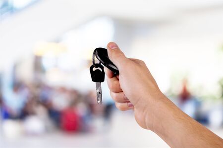 Key car key human hands designated driver concept car rental holding