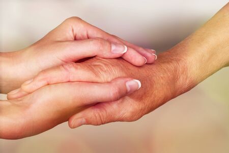 Hands of the old man and aの写真素材