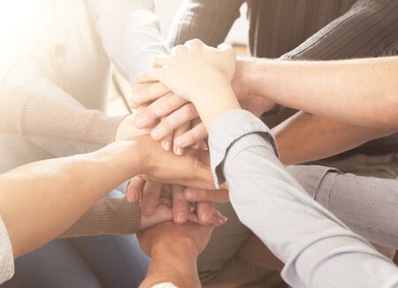 Concept of young teamwork, group hands holds hands