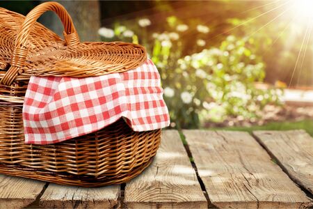 Picnic Basket with napkin om nature backgroundの写真素材