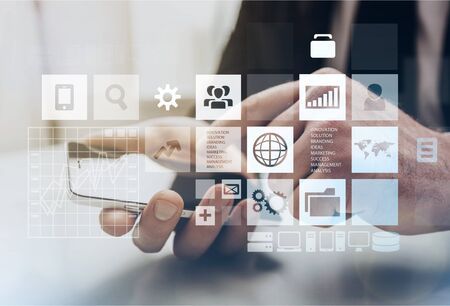 Business Intelligence, Business strategy analysis and stock market chart analyzing. Businessman working at modern office using smart phone with marketing report and  financial dashboard interface
    
    - Imageの写真素材