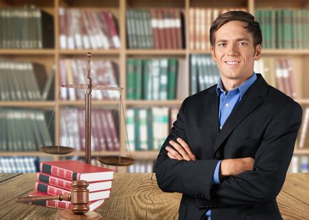 Portrait of businessman in justice officeの写真素材
