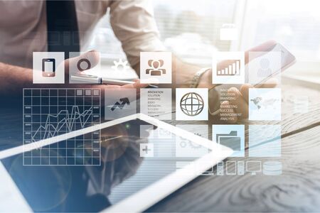 Business Intelligence, Business strategy analysis and stock market chart analyzing. Businessman...