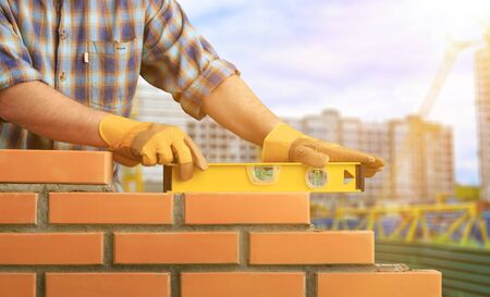 Bricklayer cement masonry build layer house workerの写真素材