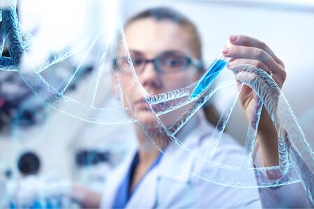 Nutrition woman expert scientist testing new stuff food products in labの写真素材